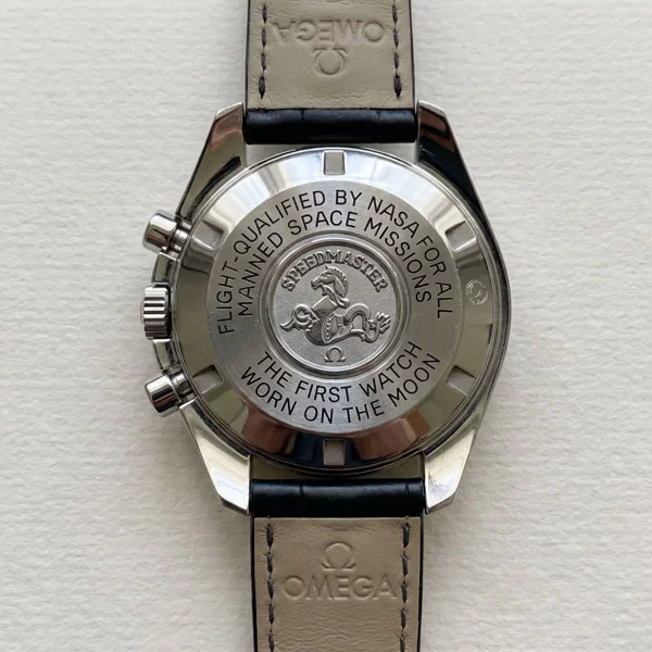Omega Speedmaster Professional Moonwatch solid stainless steel caseback engraved with Flight Qualified by NASA for All Manned Space Missions and The First Watch Worn on the Moon